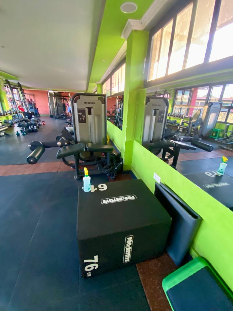 Plyometric box and weight machines beside the mirrors at Shiloh Gym