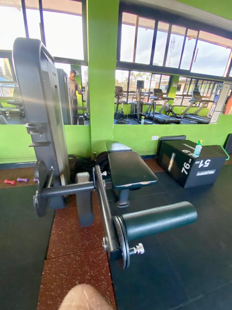 Leg extension machine on the Shiloh Gym floor