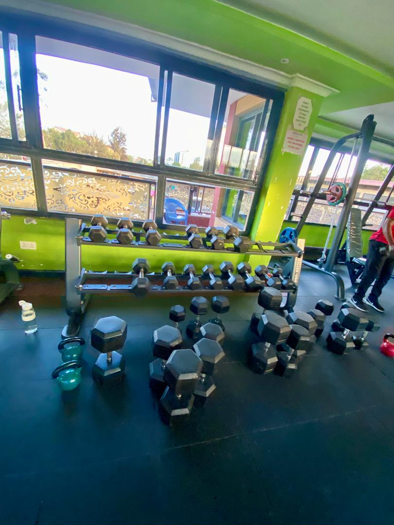 Dumbbells and kettlebells on the Shiloh Gym training floor