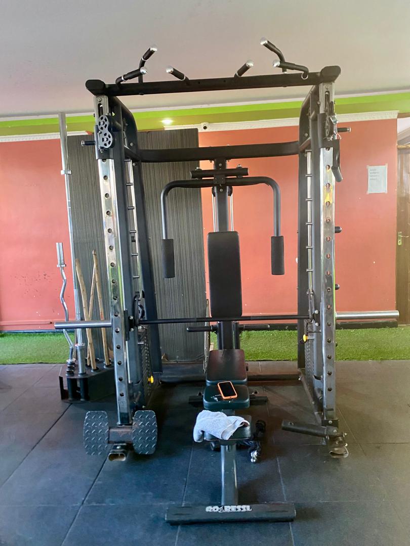 Multi-grip power rack with benches, barbells and turf at Shiloh Gym
